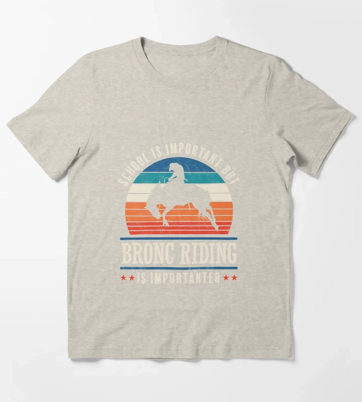 School Is Important But Bronc Riding Is Importanter Rodeo Cowboy T-Shirt Cream